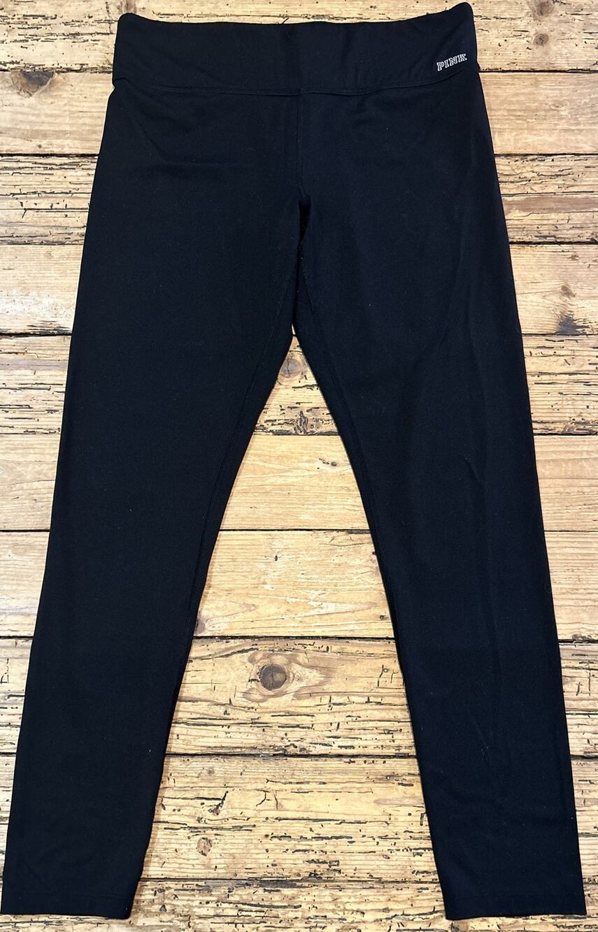 Pink Victoria Secrets Ultimate Women’s Size Large Black Cropped Leggings.